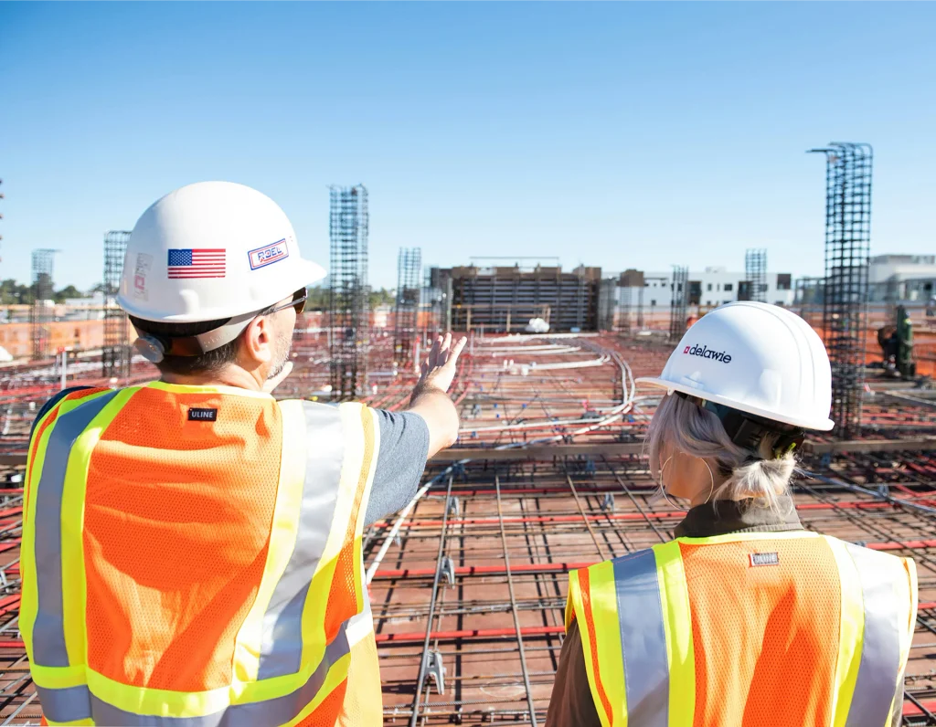 construction-managers-reviewing-site